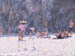 Man on beach -selling food