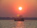 Fishing boat at sunset